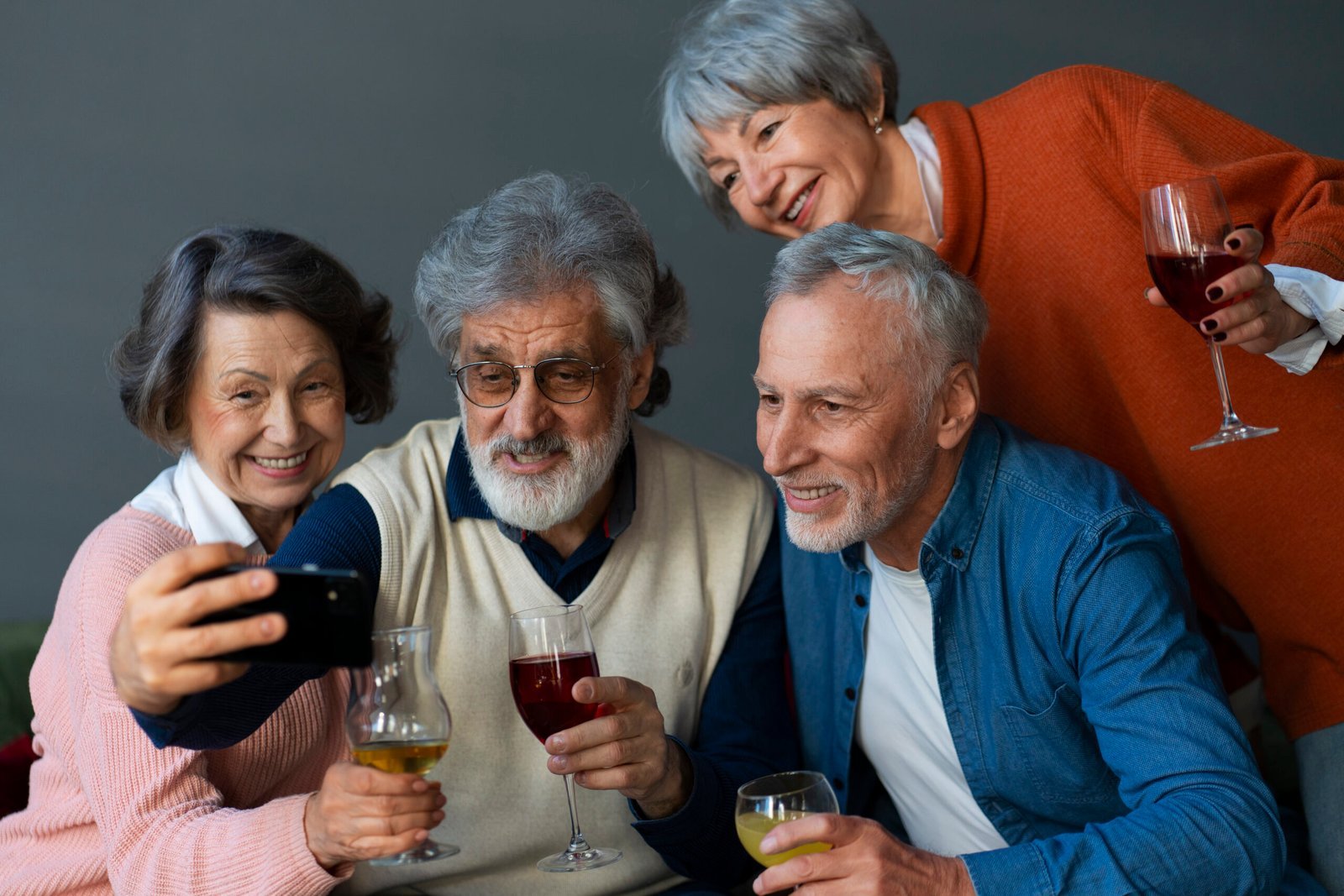 elder group friends partying scaled.jpg